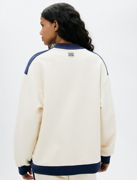 BUZO CON ESTAMPA BEIGE