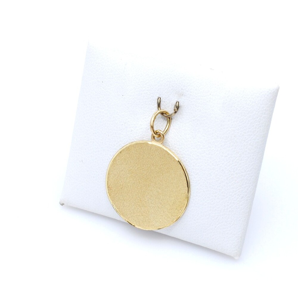Medalla en oro 18k amarillo. Díametro 20mm Medalla en oro 18k amarillo. Díametro 20mm