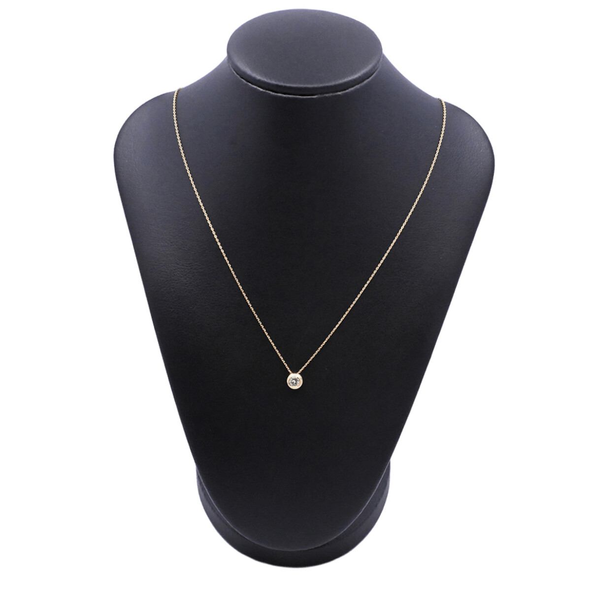 Dije oro 18k y brillante doble virola. 