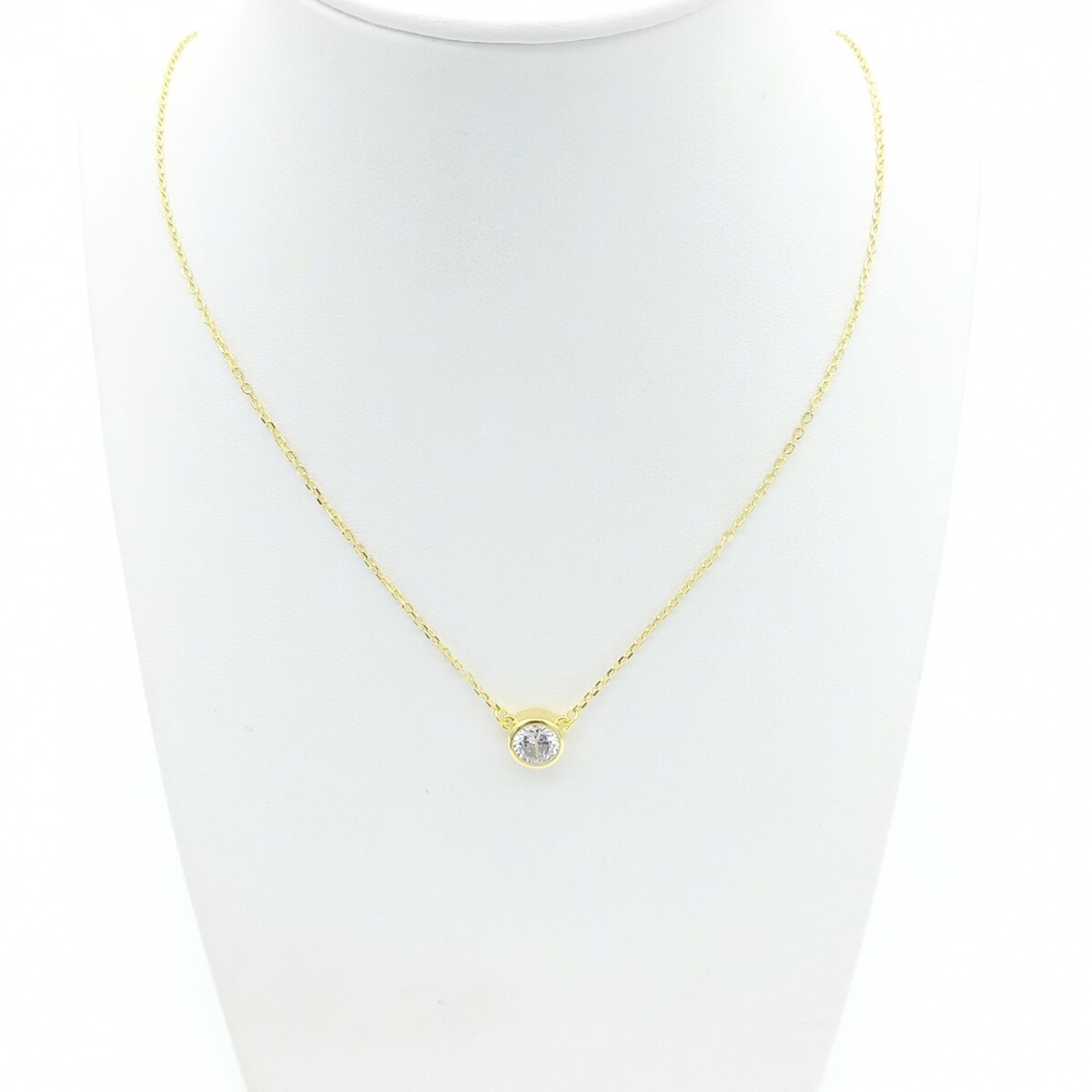 Colgante de plata con baño amarillo, PUNTO DE LUZ. 