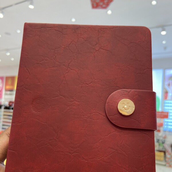 Cuaderno cuerina B6 bordo