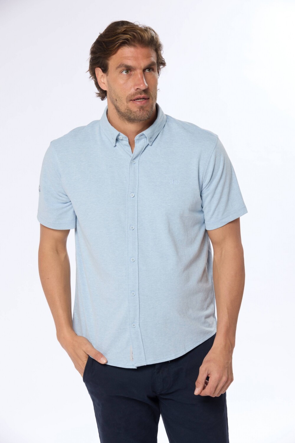 CAMISA LISA EN PIQUE Celeste