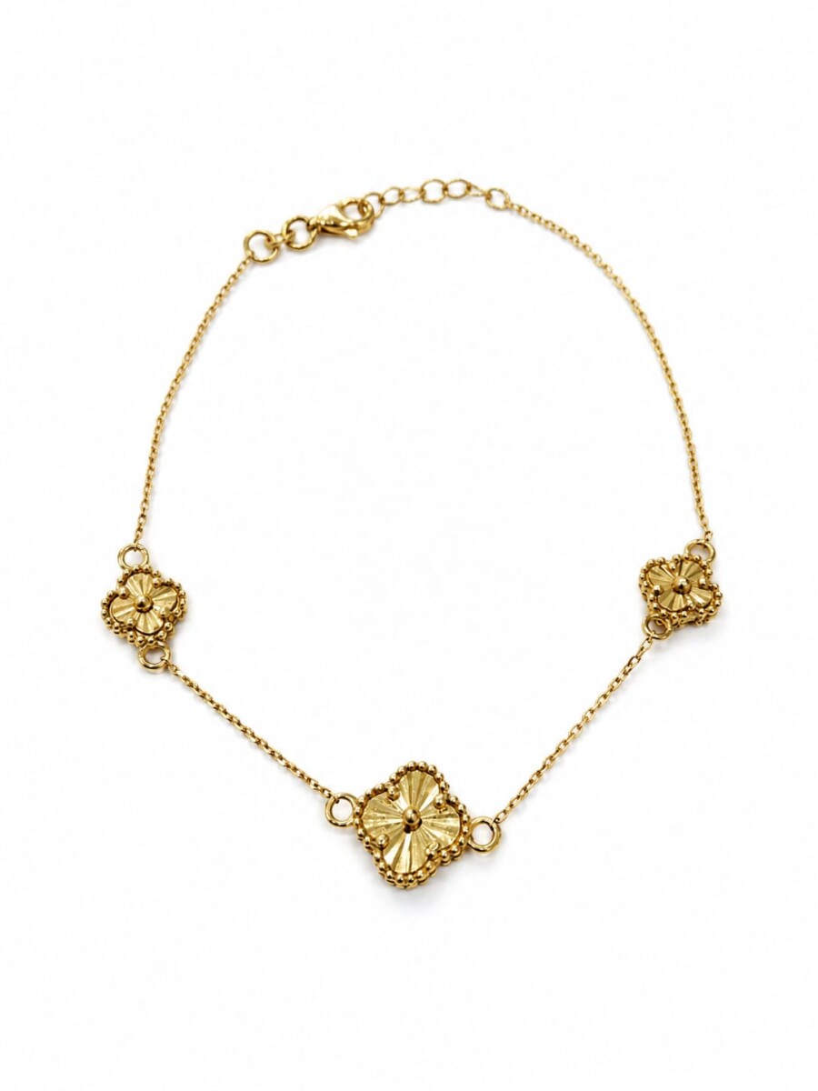 Pulsera en Oro con tres flores 