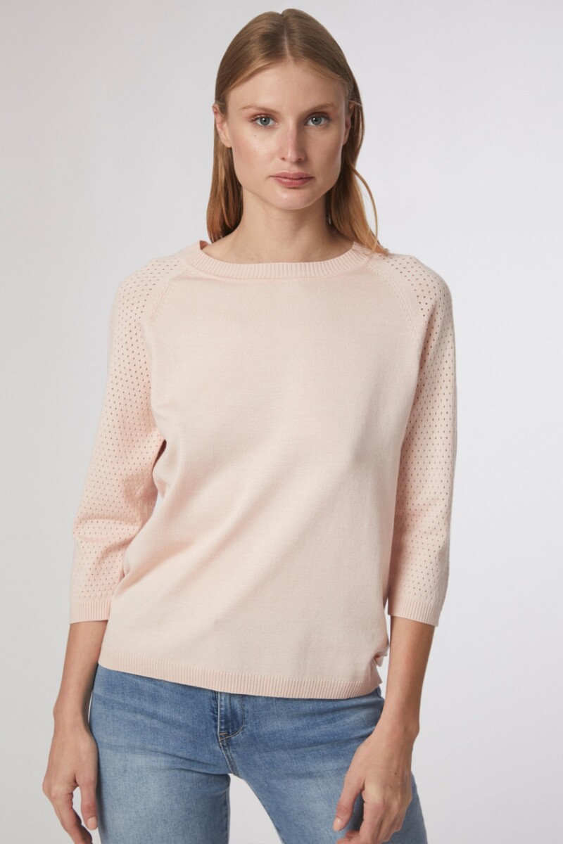 Sweater con calado rosa
