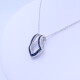 Dije oro 18k blanco con zafiros azules. Dije oro 18k blanco con zafiros azules.