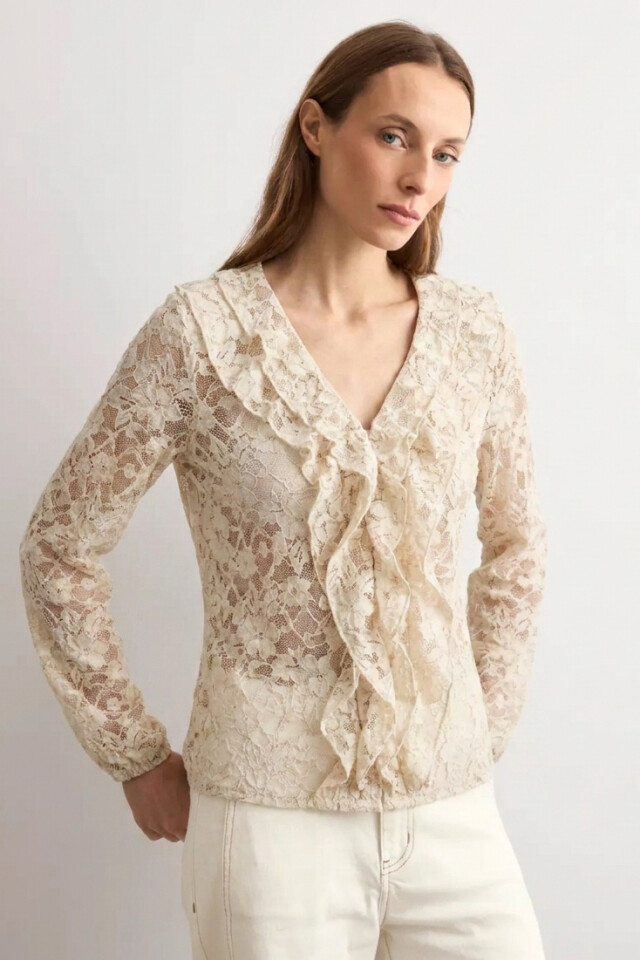 Blusa de encaje con volados beige
