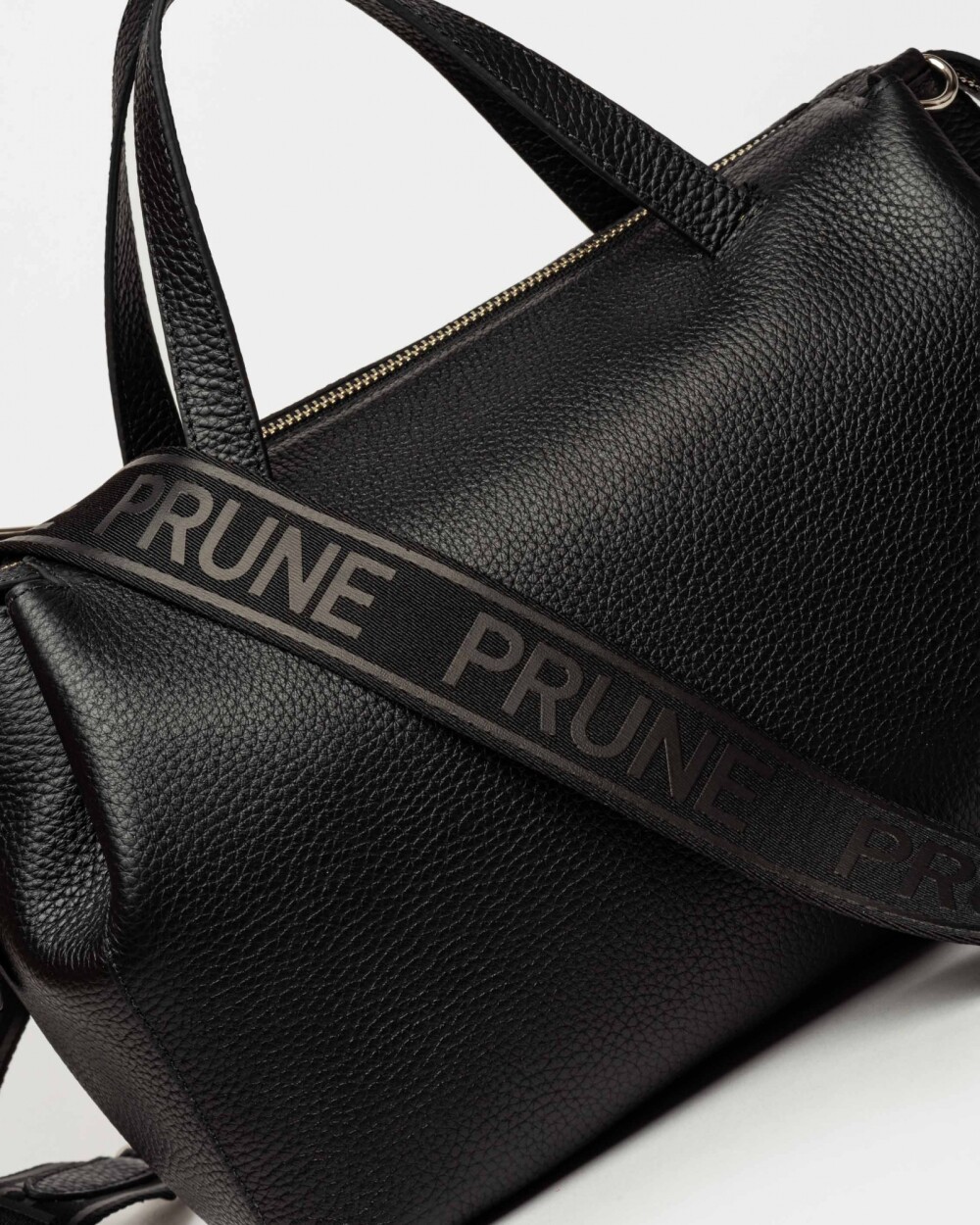 Cartera de mano Resort en cuero graneado Negro