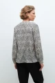 Blusa estampada beige