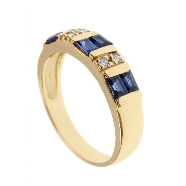 Anillo Calypso en oro amarillo 18k con brillantes y zafiros azules Anillo Calypso en oro amarillo 18k con brillantes y zafiros azules