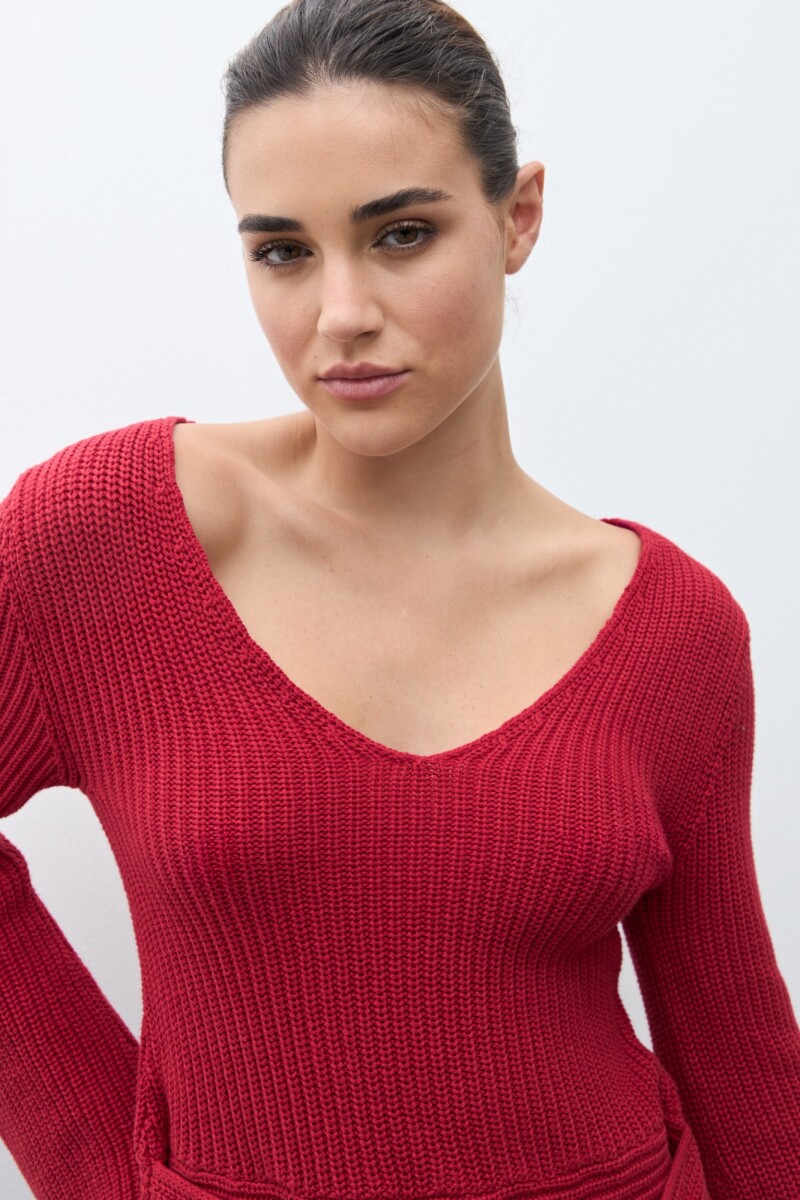 Sweater con lazo rojo