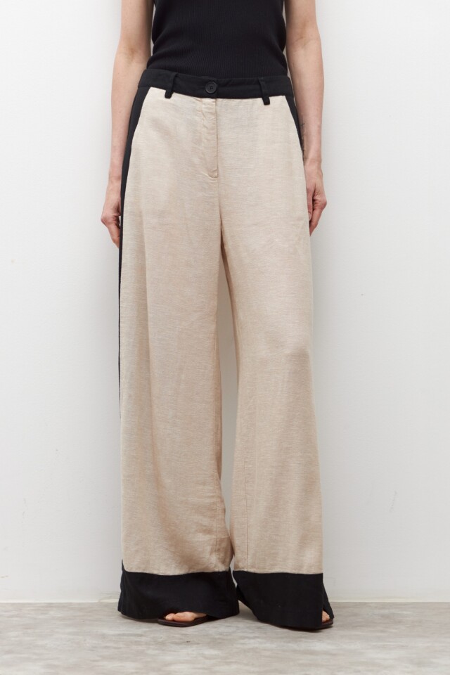 Pantalón ancho de lino bicolor con tajos negro