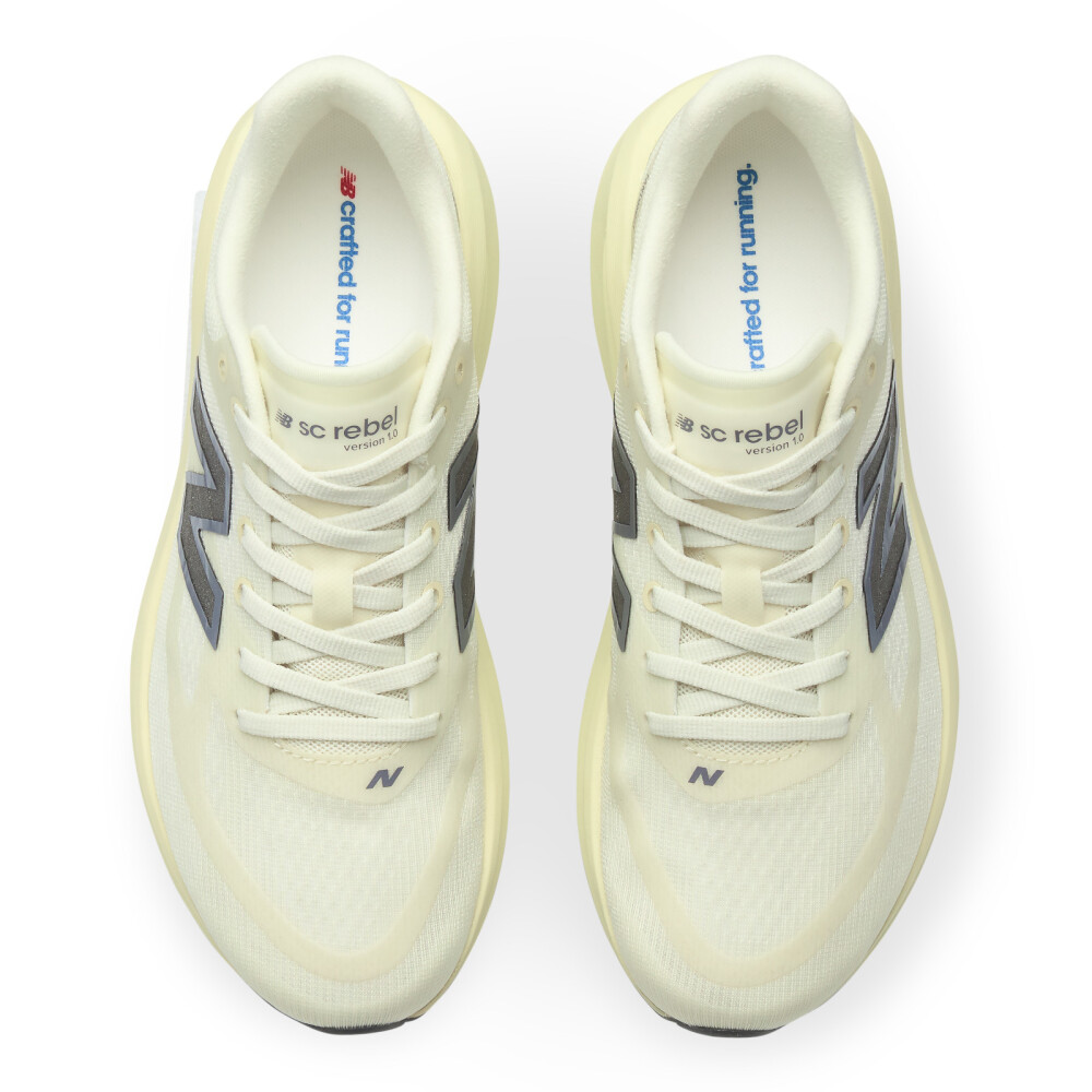 Zapatillas Running Supercomp Rebel V1 Mujer Beige