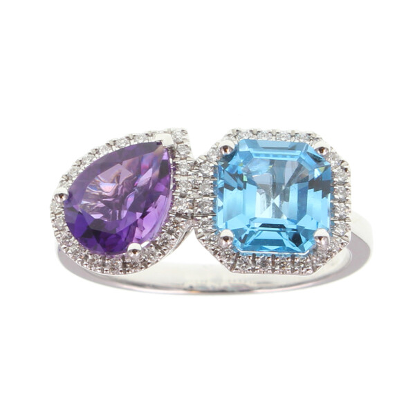 Anillo Anaí de Oro Blanco 18k con Brillantes, Topacio Azul y Amatista Anillo Anaí de Oro Blanco 18k con Brillantes, Topacio Azul y Amatista