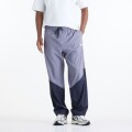 Pantalón New Balance de Hombre - Sport Legacy - MB61R010AA9 PURPLE