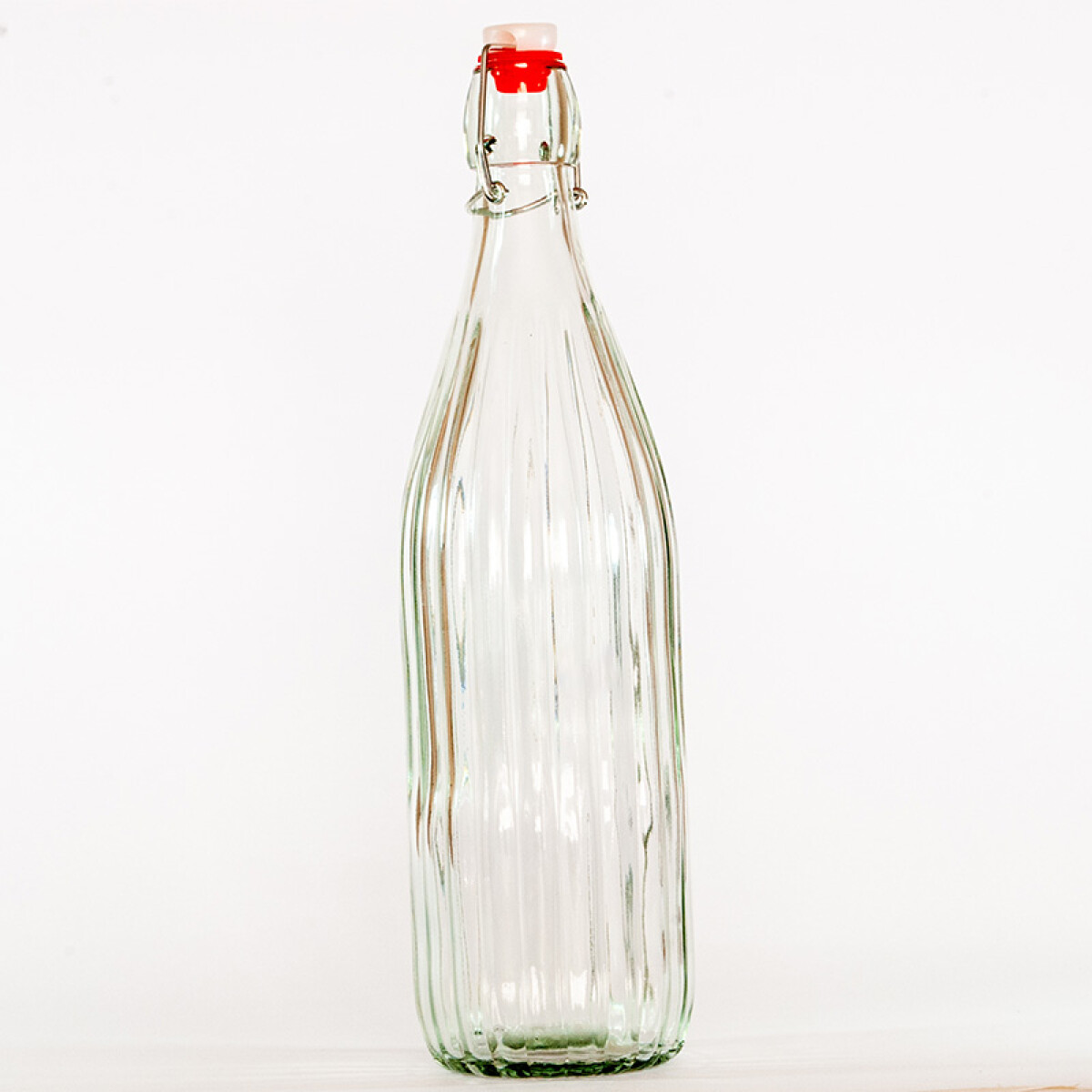 Botella De Vidrio con Tapon 1lt Acanalada 