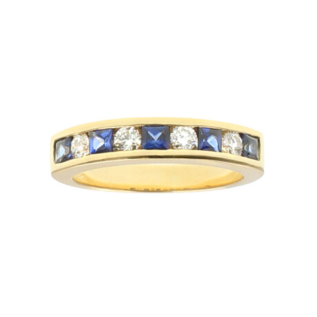 Anillo medio sin fin chana Bicolor en oro amarillo 18k con brillantes y zafiros Anillo medio sin fin chana Bicolor en oro amarillo 18k con brillantes y zafiros