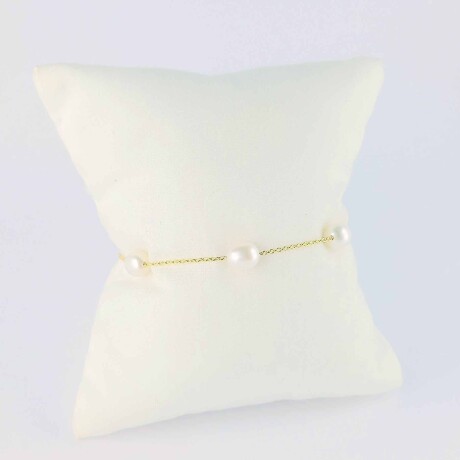 Pulsera de oro 18 ktes con perlas de río. Pulsera de oro 18 ktes con perlas de río.