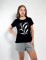 Remera estampada con brillos Brenda Negro