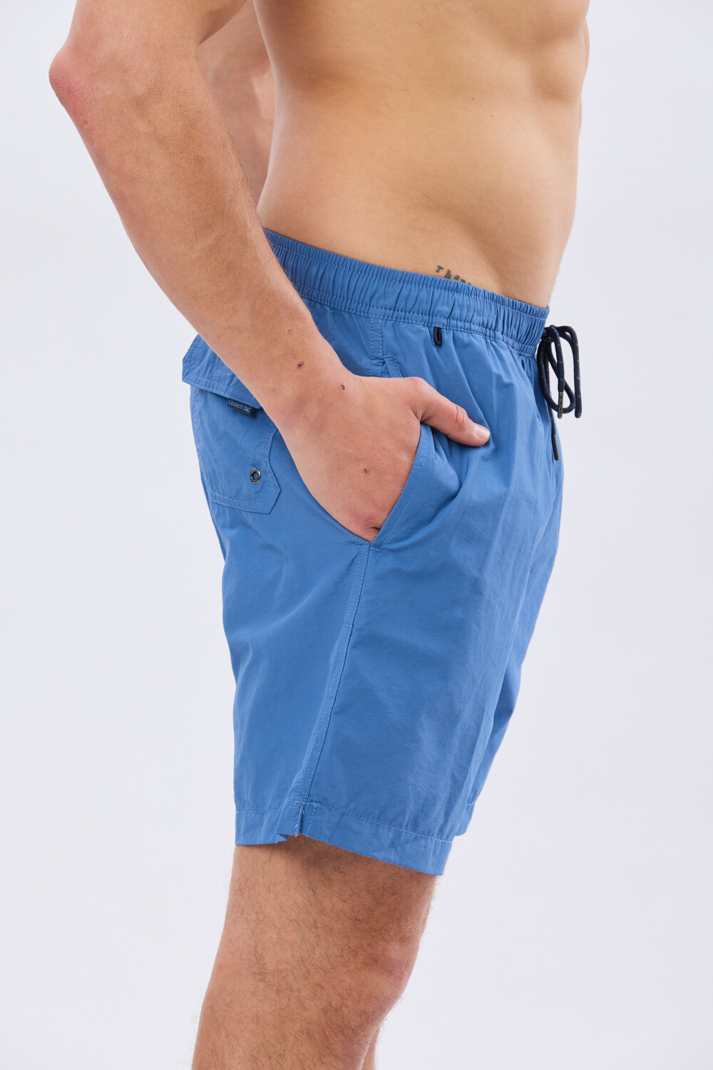 SHORT DE BAÑO LISO Celeste