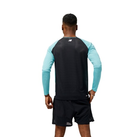 Remera New Balance de hombre - MT31242FAD CELESTE