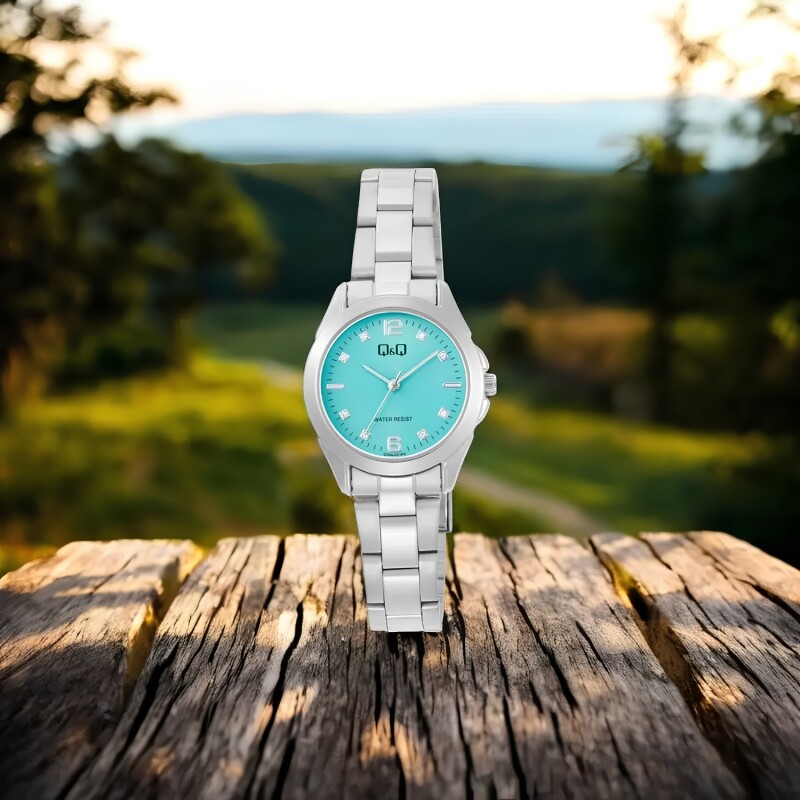 Reloj análogo Q&Q esfera turquesa Modelo C05A021PY Reloj análogo Q&Q esfera turquesa Modelo C05A021PY