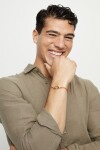 PULSERA DE CUERO NARANJA CON MOSQUETÓN ENTRELAZADO BAÑADO EN ORO 18K Pulsera