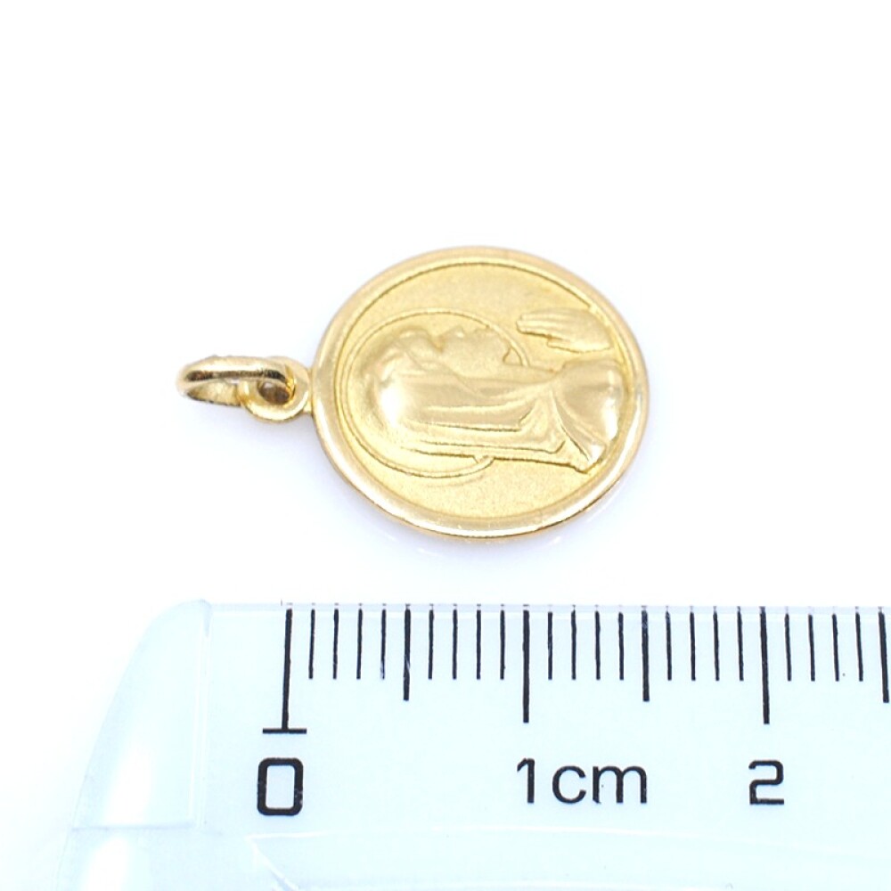 Medalla en oro 18k amarillo con imagen religiosa. Diámetro 14mm Medalla en oro 18k amarillo con imagen religiosa. Diámetro 14mm