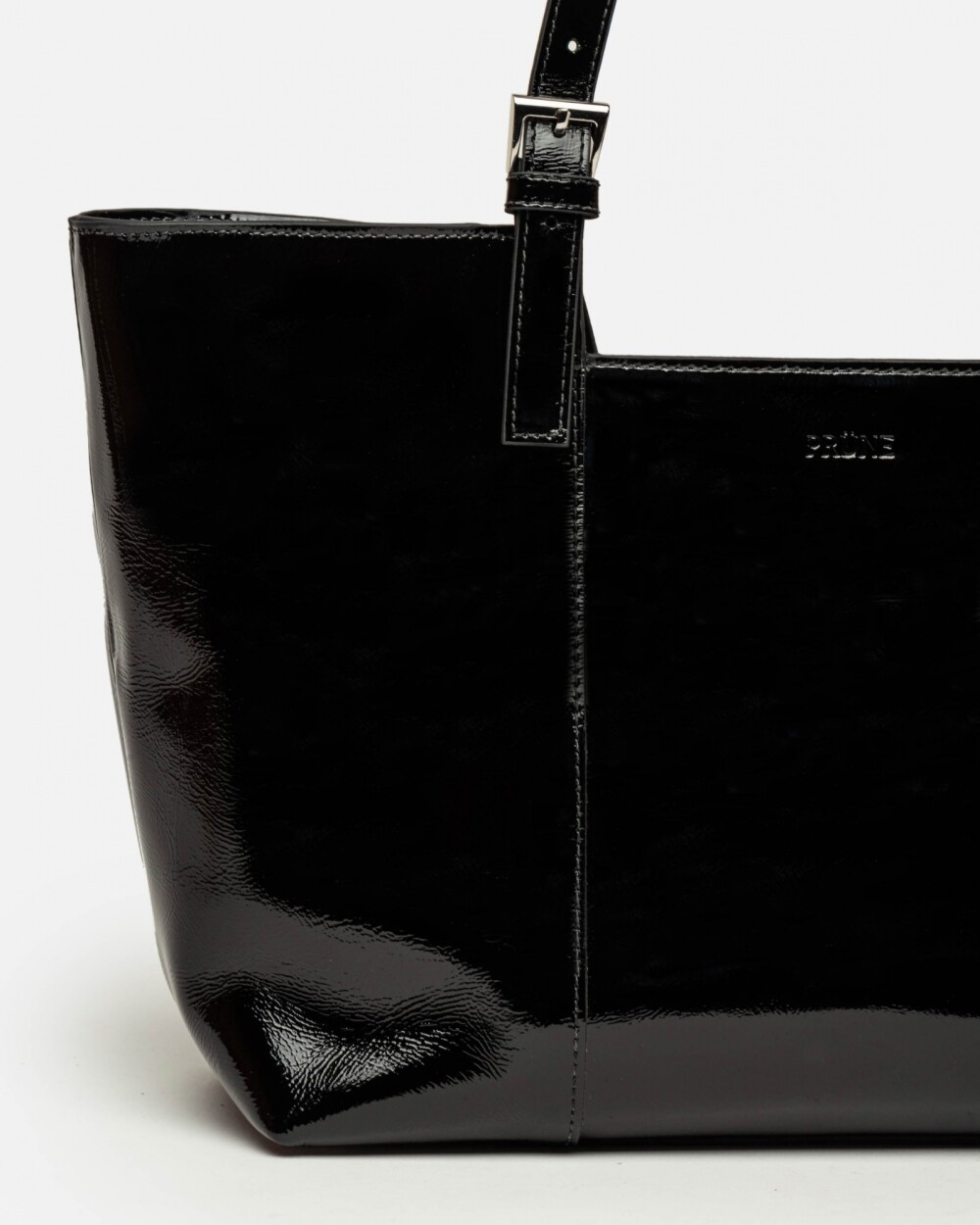Bolso The Icon en cuero charol arrugado Negro