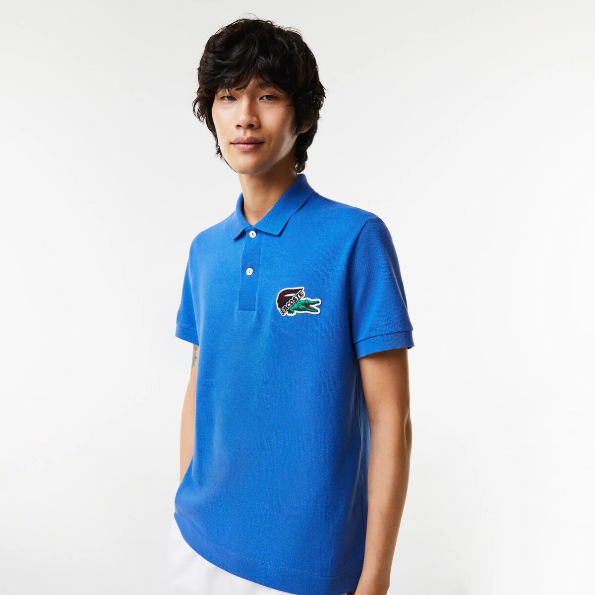 Lacoste polo costo sale