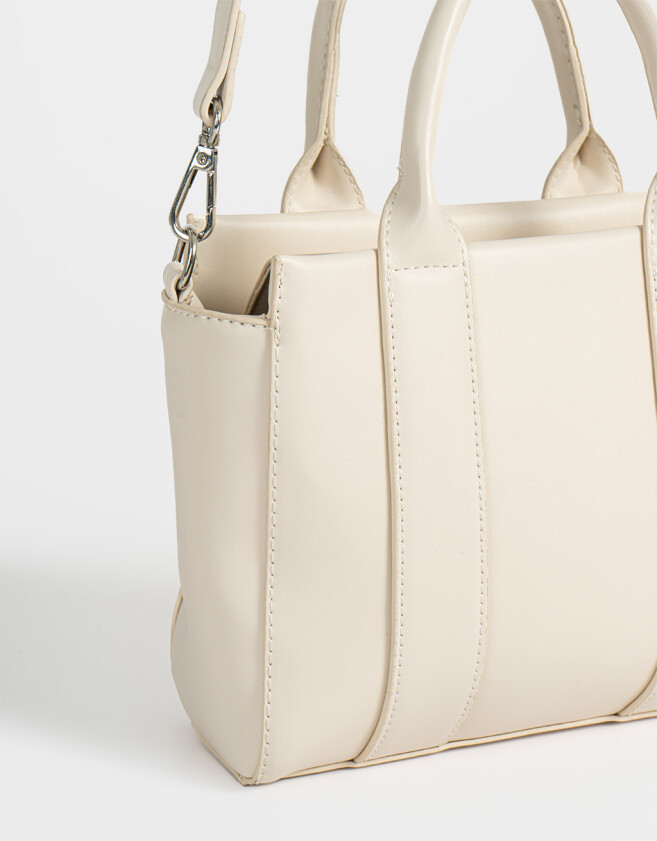City Cartera City Con Charm - Blanco Crudo