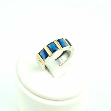 Anillo de Plata 925 con double de Oro 18k y Circonias azules. Anillo de Plata 925 con double de Oro 18k y Circonias azules.