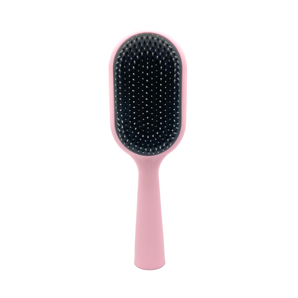 Cepillo de cabello con accesorio rosa