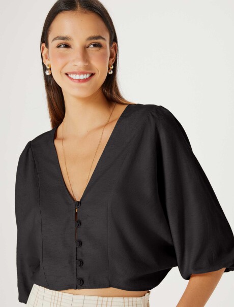 BLUSA CON MANGAS ABULLONADAS NEGRO