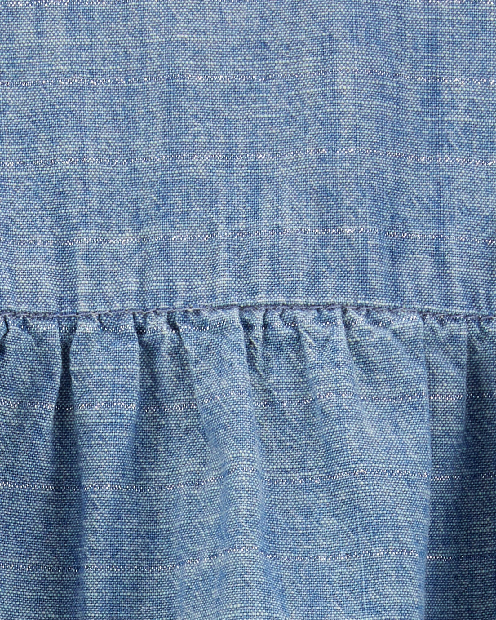 Body bombachudo de chambray, espalda con ojal corazón Body bombachudo de chambray, espalda con ojal corazón
