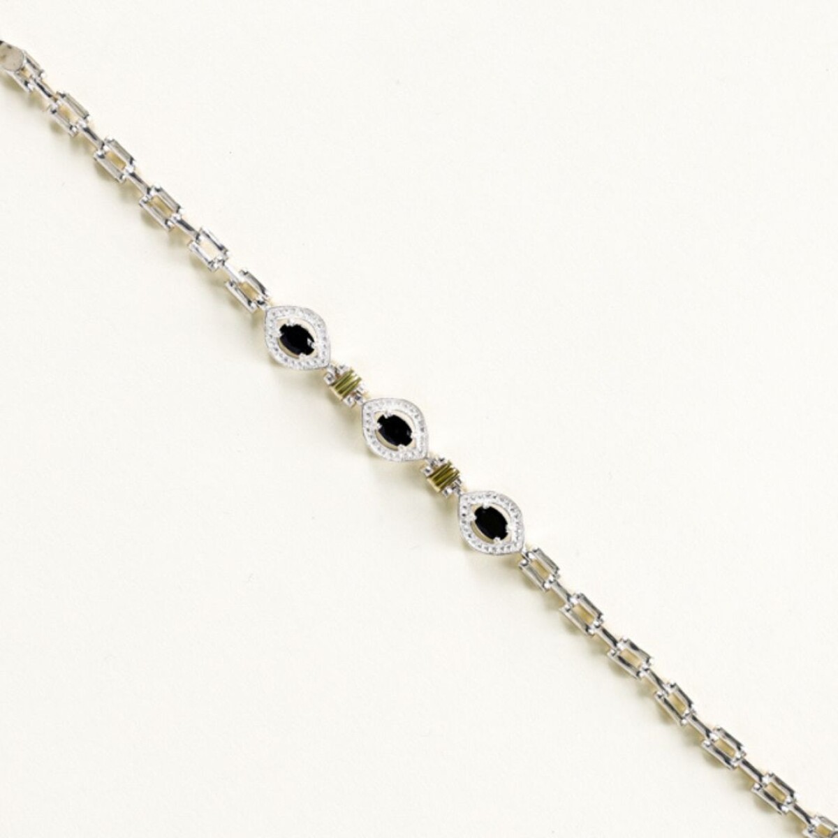 Pulsera 3 Circonias Negras - Plata y Oro 