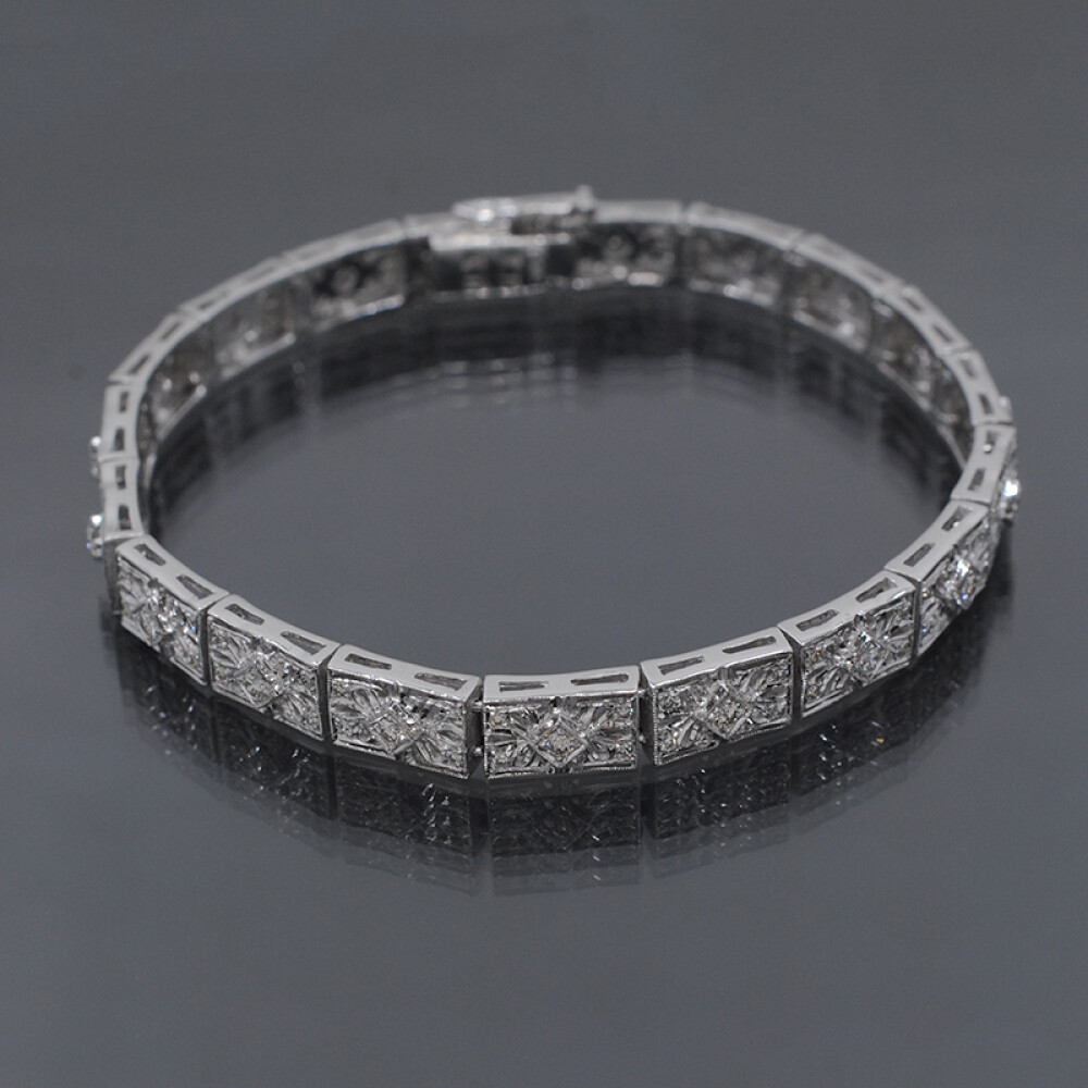 Pulsera en oro blanco 18k y brillantes Pulsera en oro blanco 18k y brillantes