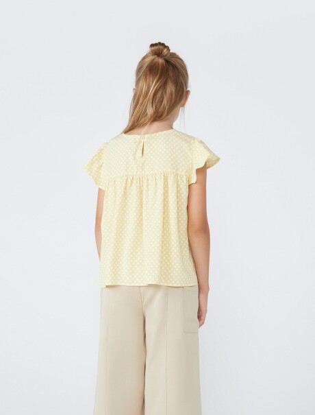BLUSA INFANTIL CON ESTAMPADO AMARILLO