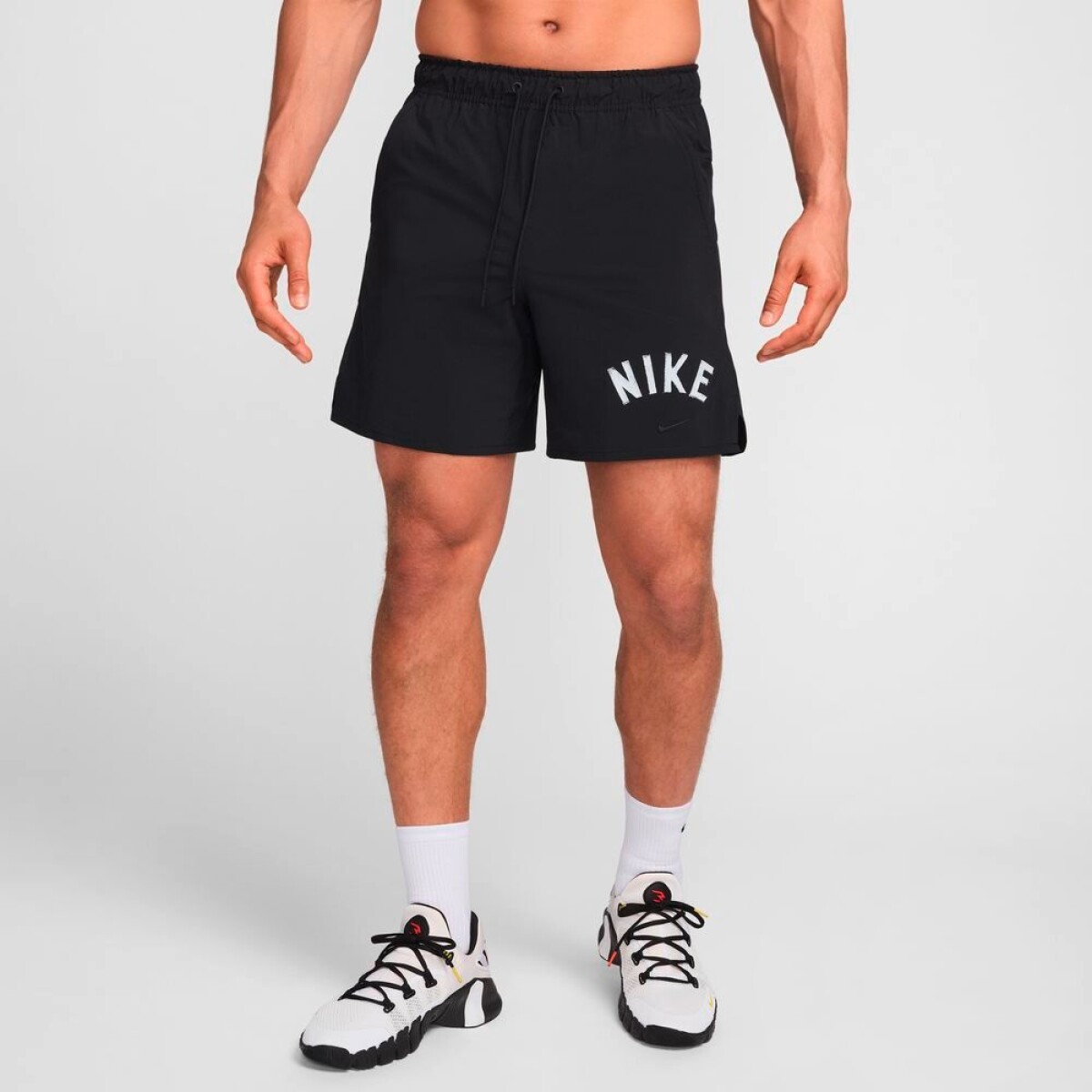 Pantalón Corto Nike Dri-Fit Unlimeted Swoosh 7" de Hombre - Negro 