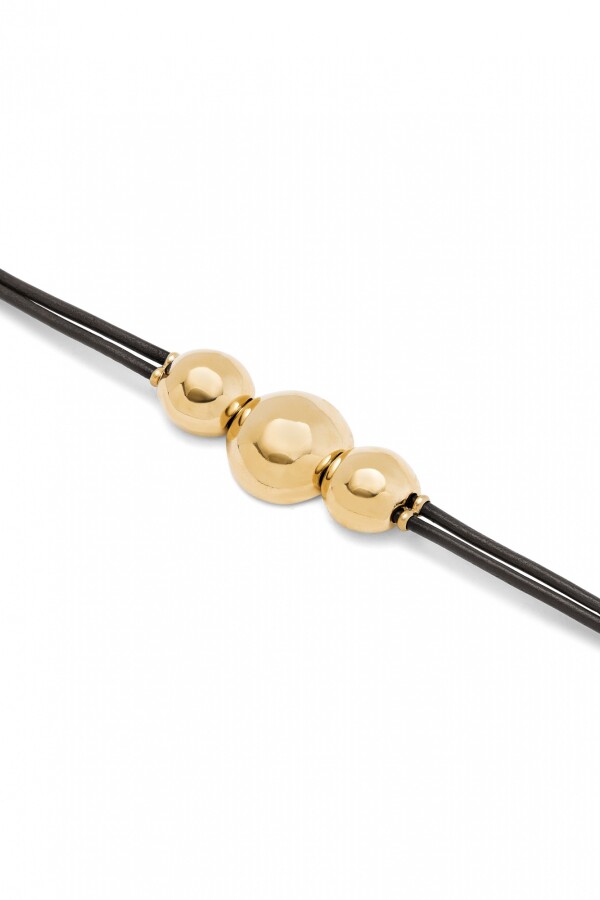 PULSERA DE CUERO CON TRES CUENTAS GRANDES DE ALEACIÓN DE METALES BAÑADAS EN ORO 18K Pulsera