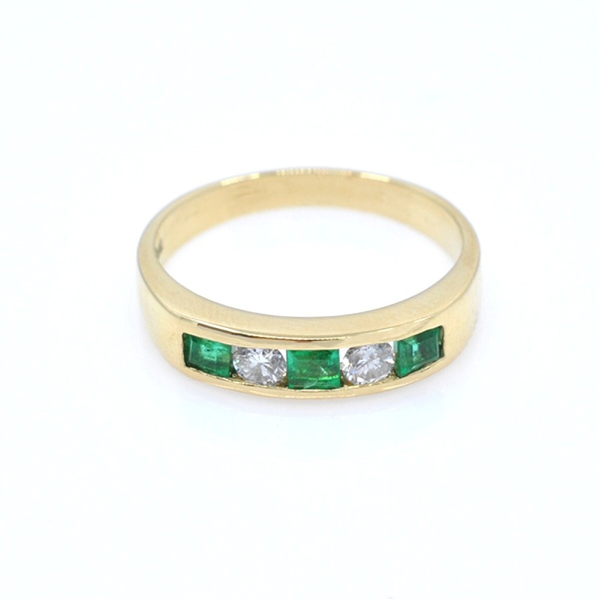 Anillo en oro 18k con esmeraldas y brillantes 