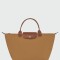 Longchamp -Cartera Longchamp plegable de nylon con cierre y asa corta, Le pliage M Beige
