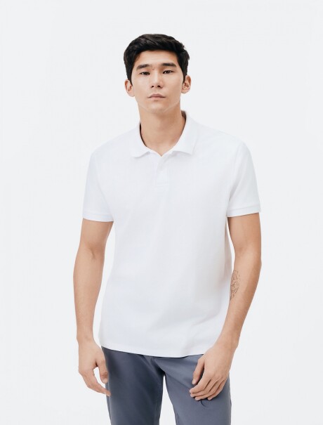 POLO BÁSICA EN TELA PIQUÉ BLANCO