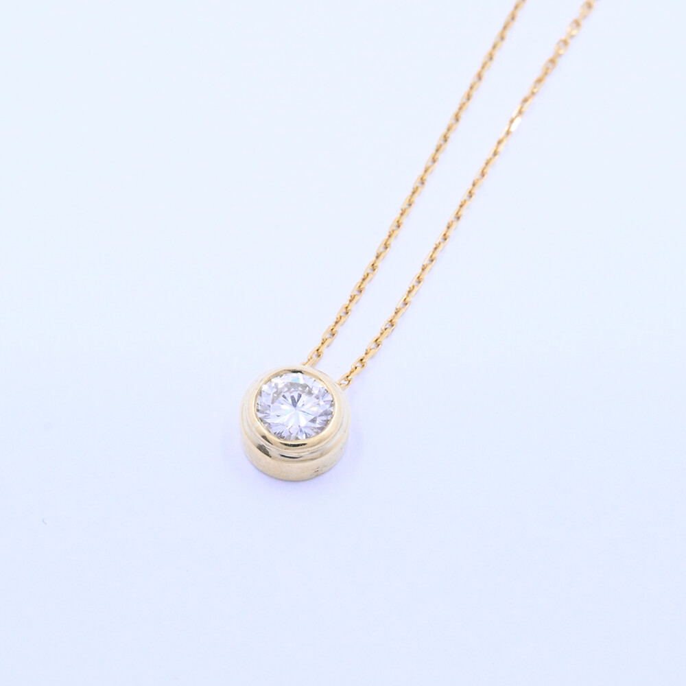 Dije oro 18k y brillante doble virola. Dije oro 18k y brillante doble virola.