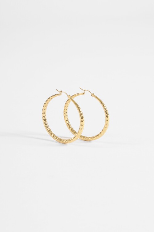 Aros acero textura dorado