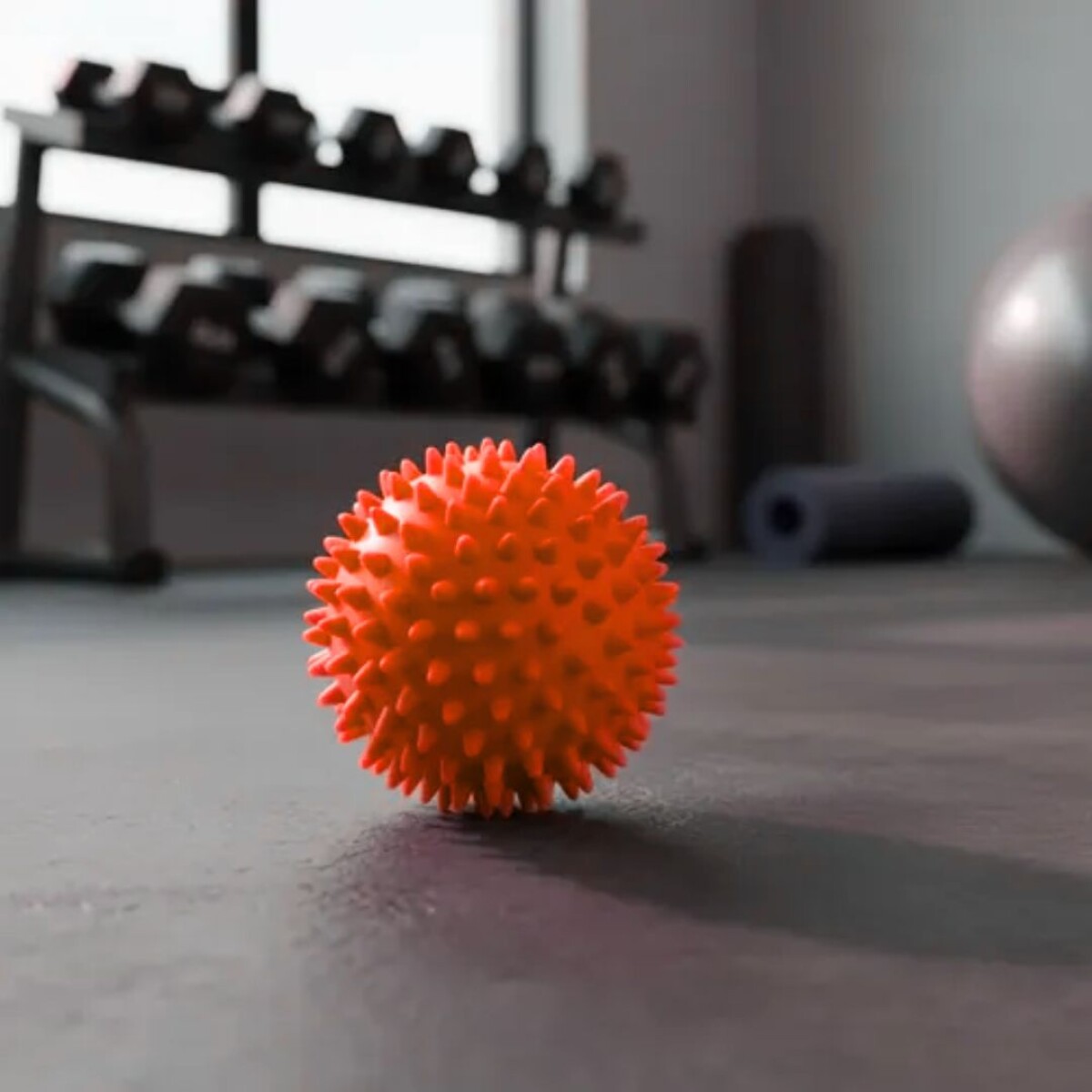 Mini pelota con pinchos rígida para masajes de 8cm 