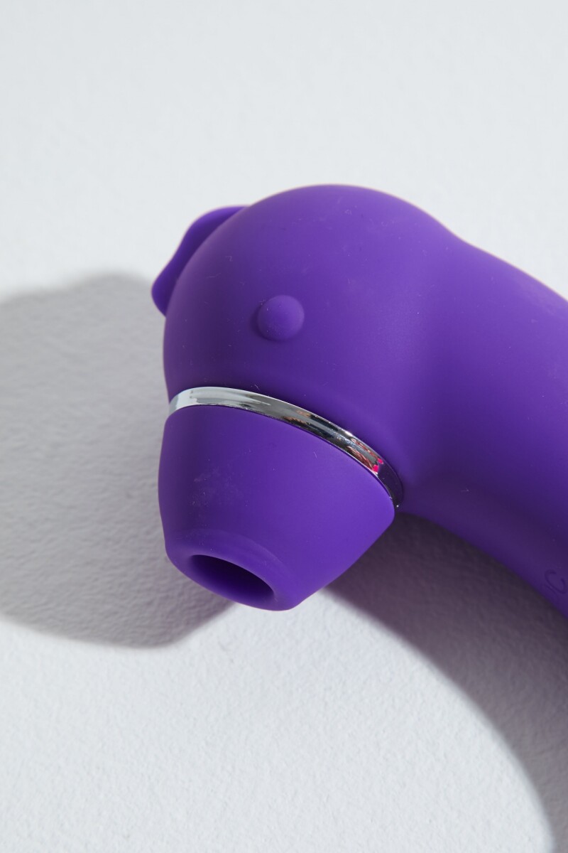 Succionador y vibrador recargable USB violeta