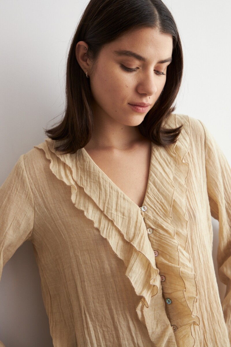 Blusa con volados beige