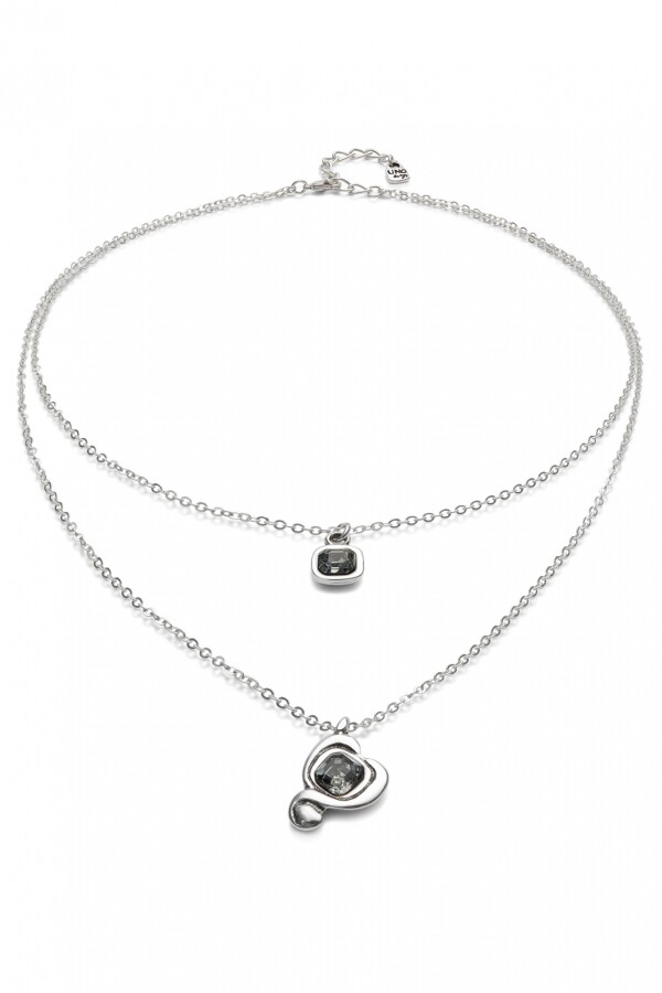 COLGANTE DE ALEACION DE METALES BAÑADO EN PLATA DE LEY CON DOBLE CADENA Y CORAZON CON CRISTAL NEGRO Colgante