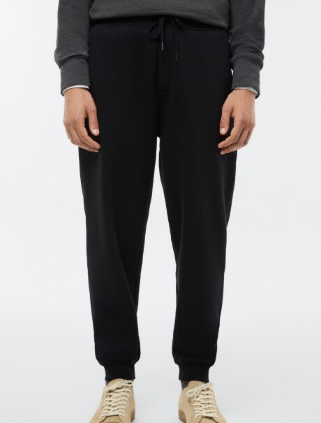 PANTALONES DEPORTIVOS BÁSICOS CON FORRO POLAR NEGRO