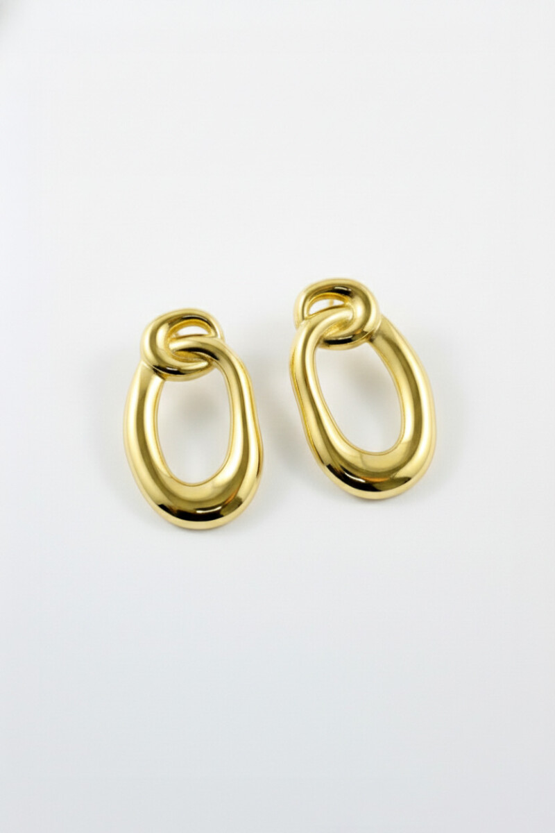 Caravanas de acero forma orgánica dorado